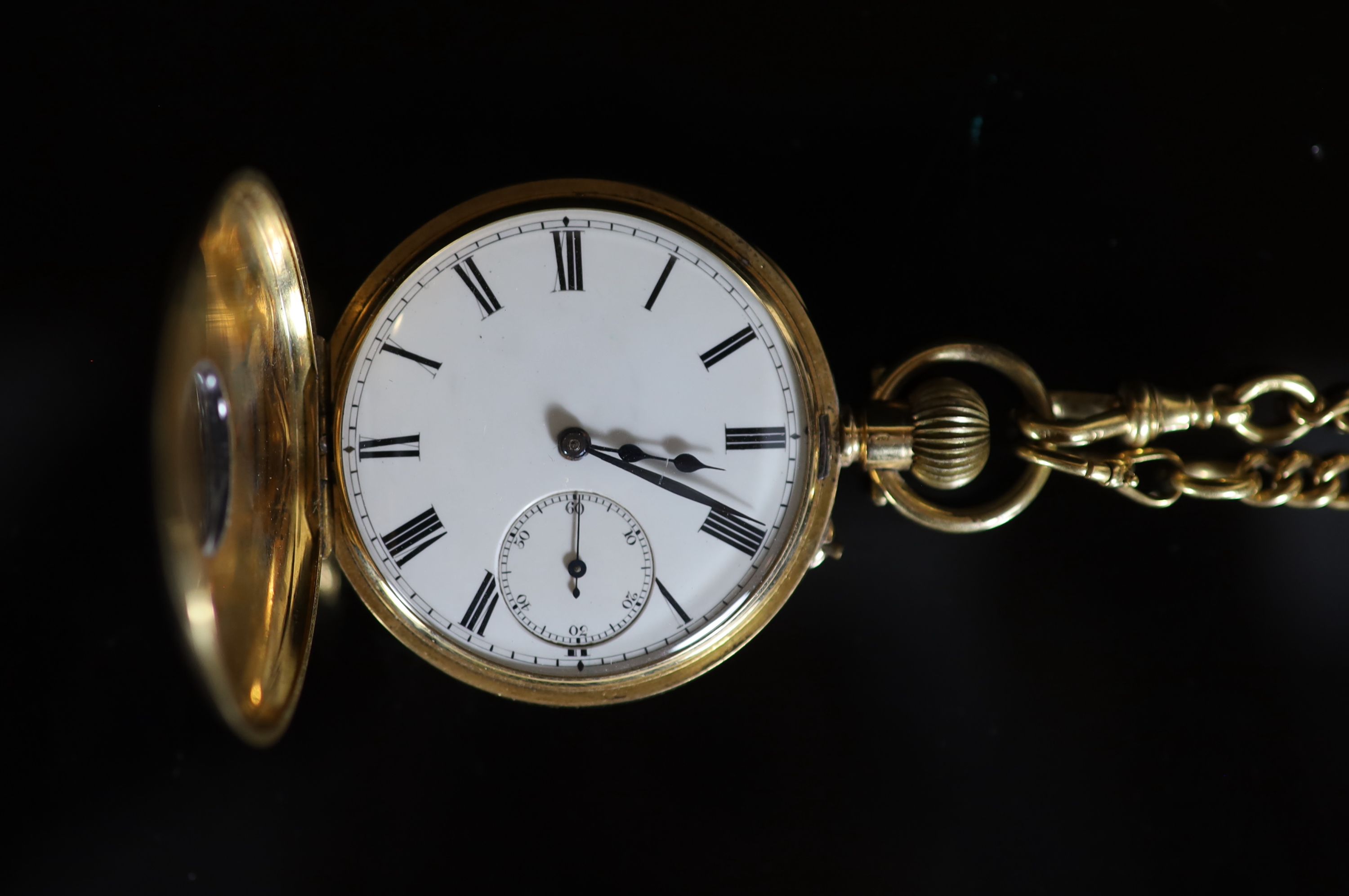 A late 19th/early 20th century 18K gold half hunter keyless pocket watch, by William Greenwood of Leeds, together with an 18ct gold curblink albert